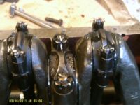 Centre Main Bearing Cap and No's 2 & 3 Big End Bearing Caps bolted in place and secured with Cotter Pins. Centre Main Bearing Cap and No's 2 & 3 Big End Bearing Caps bolted in place and secured with Cotter Pins.