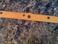Sump gasket with oil pick up hole 'looking from beneath'. Sump gasket with oil pick up hole 'looking from beneath'.