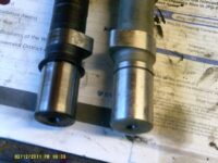 Camshafts, old with circlip and new without.