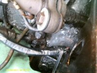 Loom tied back to clear steering column.
