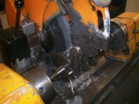Crankshaft on re-grinding machine.