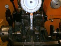 Crankshaft on re-grinding machine.